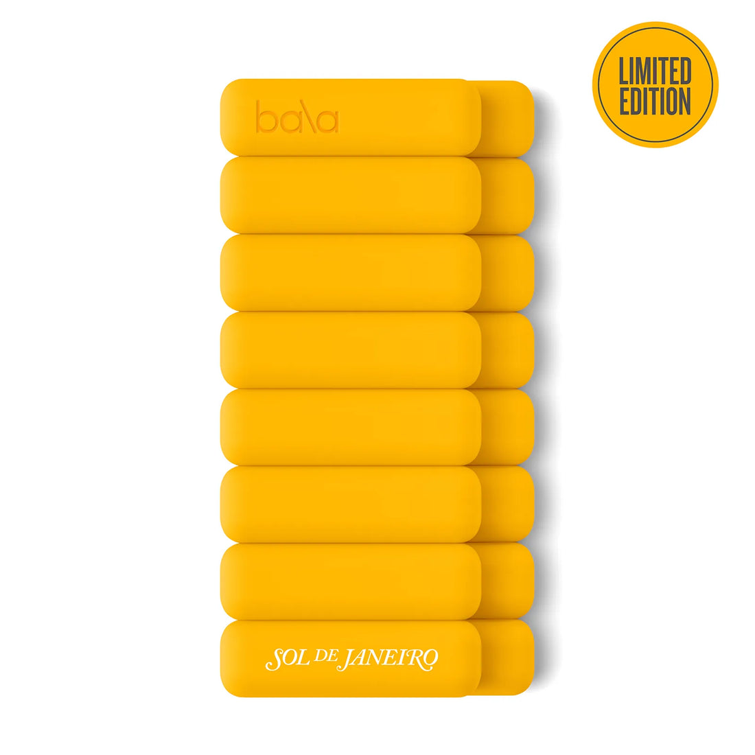 Stack of yellow bars with 'bala' and 'Sol de Janeiro' branding on a white background.